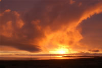 Photo of sunset over California coast